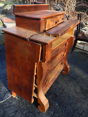 BEFORE: Weather beaten Empire chest of drawers and a broken mahogany inlaid chair.