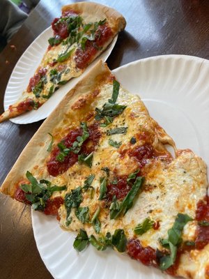 Margerita slice with tomato, fresh mozzarella and fresh basil.   Culinary divinity.