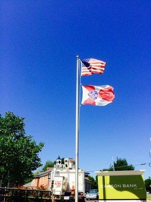 Carson bank in Wichita, Kansas shows their pride with the USA flag and the Wichita flag.