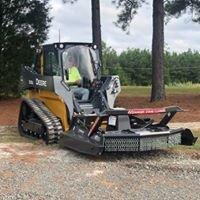 Skid steer with bush hogging attachment