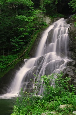 Hike to one of many waterfalls around Stowe.