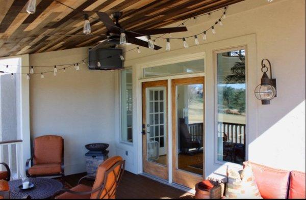 Custom pallet wood porch ceiling.