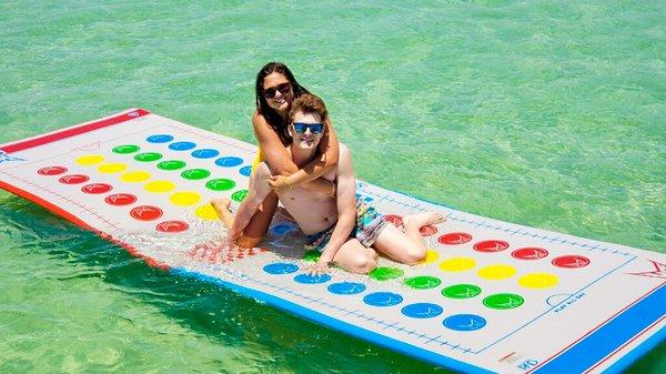 Twister on the water! This couple enjoyed our 5 by 15 water mat!