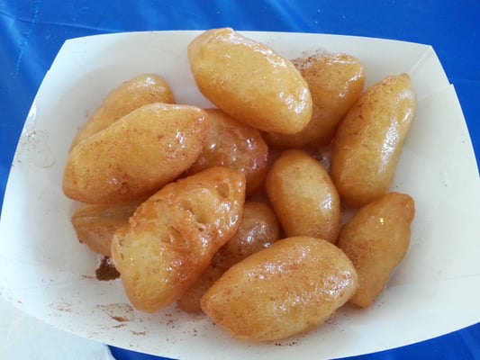 Loukoumadas. Greek fried dough soaked in simple syrup with a dusting of cinnamon. Excellent.