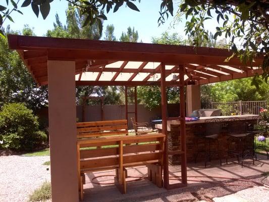 Shade covering and guest benches by Christian Carpentry