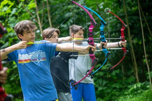 Archery target practice with friends.