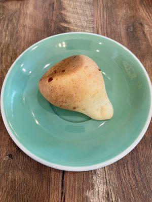 Colombian pandebono. "Cheese bread" It was really good. Just wish it was bigger. Next time I'm going to get my own.