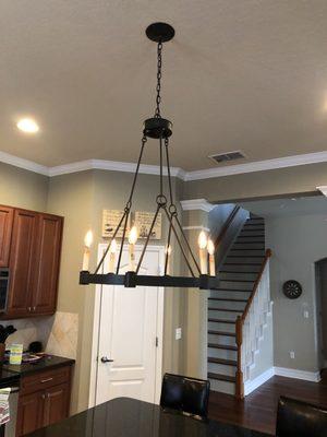 Installed one new fixture over island.