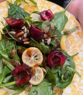 Fall salad with limequats, cherries, pepitas and balsamic vinaigrette.