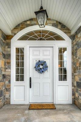 Custom entry door with Arched roof.