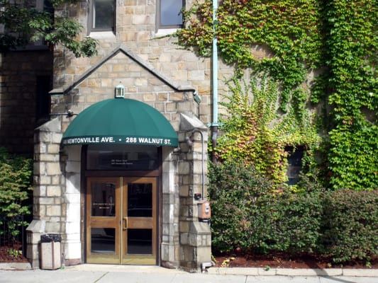 Entrance off Newtonville St. and the corner of Newtonville and Walnut.