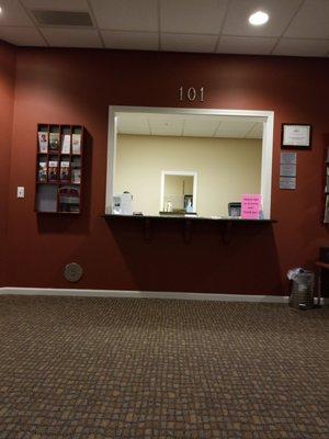 The desk at the physical therapy side, which is to the right when you enter the neurology building