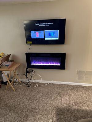 Tv and fireplace mounting, customer did not want wires hidden