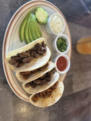 Carne asada and al pastor soft tacos