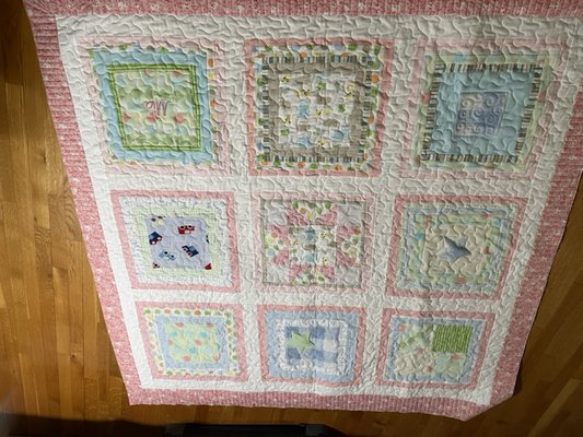 Client requesed a box of receiving/ baby blankets used by 2 generations to be made into three separate quilts. This is one of them.