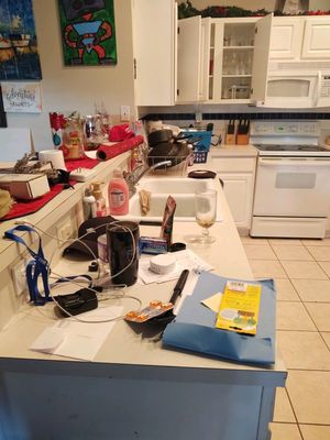 Kitchen counter before a Queens Of Clean Maid Service