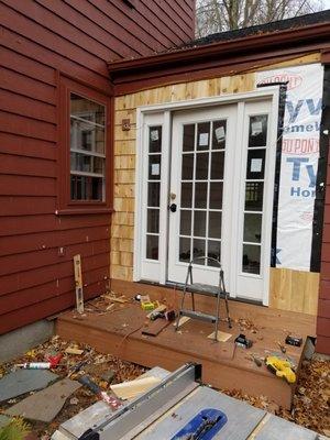 Porch conversion to mudroom. Mahogany step.  Barrington RI