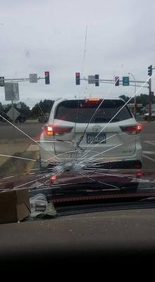 The windshield taken out by the North Pine Aggregate truck - that they took no responsibility for when a rock flew from their untarped load