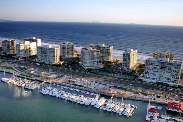 Specializes in sales and leasing of beachfront high-rise condos. Information and photographs about available properties.