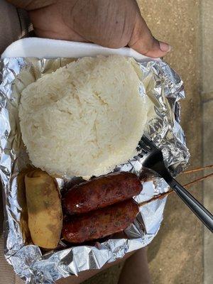 Thai from one of the food vendors. Lao sausage, sticky jasmine rice, and an egg/spring roll.