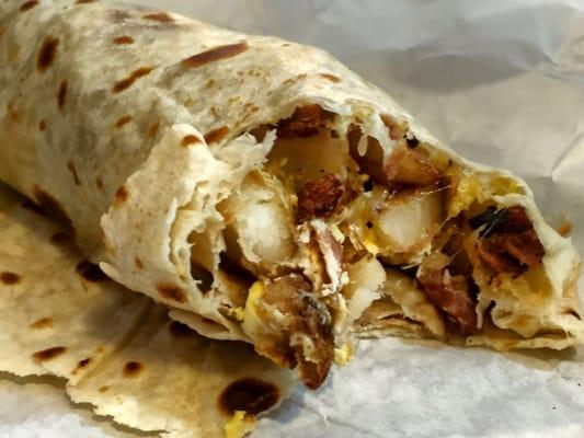 The famously delicious Breakfast Burrito with Potatoes, Cheese and Bacon.