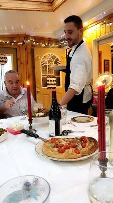 Chef David serving focaccia