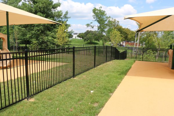 Metal playground fence.