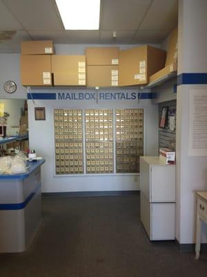 Store interior, post office boxes.