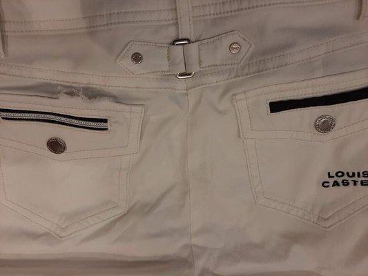 Poorly stitched pocket compartment on left