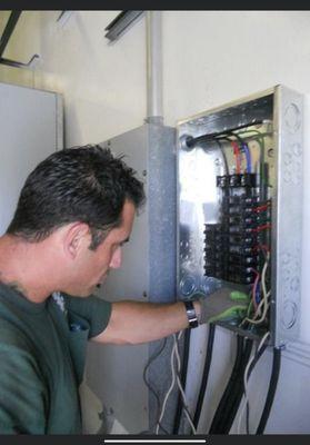 Installation of a commercial service panel.