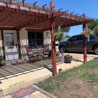 Nice porch with rocking chairs.There's also a table and chairs to eat your breakfast on.