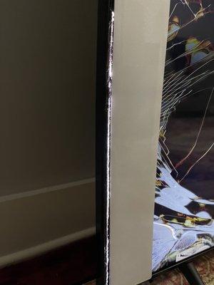 Cracked tv with glass coming out