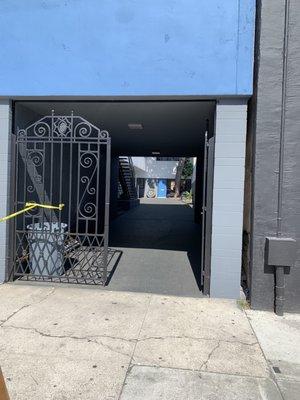 Entrance from the street to Capitol Barbershop.