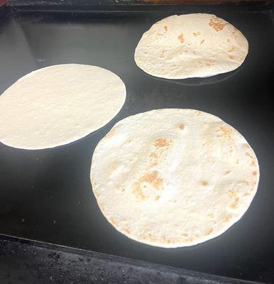 Hand made fresh flour tortillas made to order come and try them also sell them by the dozen