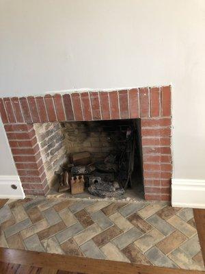 this is what we are left with... over 1yr into our project- phil chose the brn pavers, no mantle,he suggested we remove the original. UGLY!