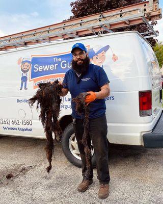 Removed roots that were clogging up the sewer line.