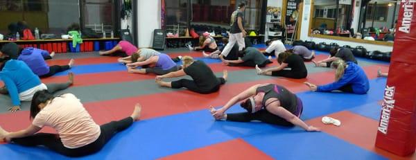 Womans kickboxing class warm up