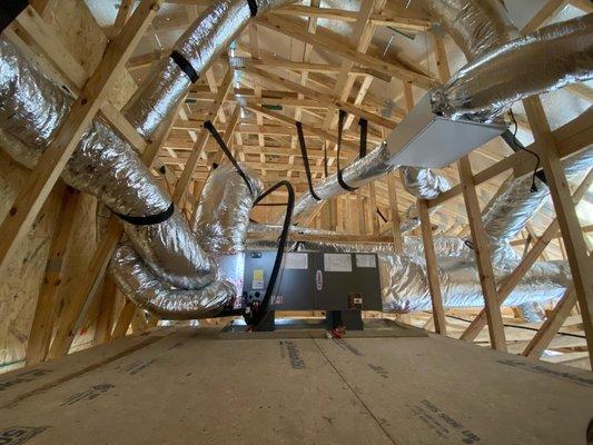 Masters of residential HVAC installation. (Look at those beautiful flex runs).