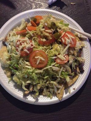 Nachos, mixed chicken and steak.