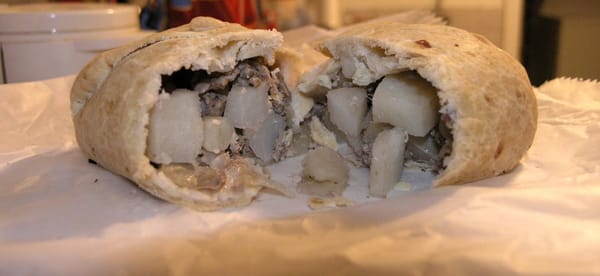 A peek inside of a Beef Pasty.