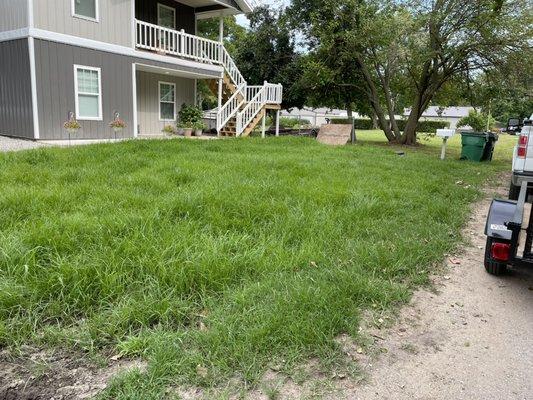 Multi unit apartments lawn, before.