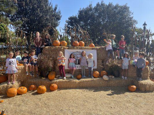 Pumpkin patch field trip. Students are out about learning from their community.