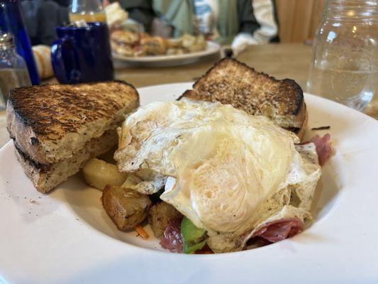 Corned beef hash and basted eggs