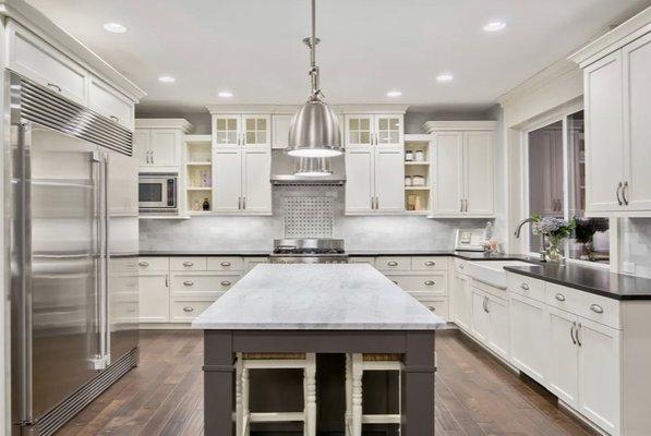 Custom made kitchen cabinets with self closing drawers.