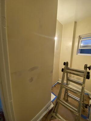 Repair drywall and paint 2 bathrooms