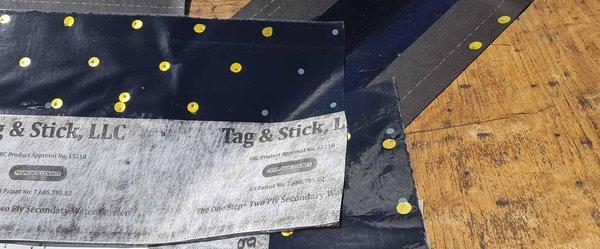 Tag & Stick is a two ply water barrier underlayment system.