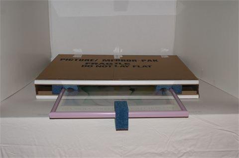 2 - Slide frame into glass & mirror carton.