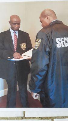 Mr. Paul I. Meaway (L), and Mr. Daniel White (R), reviewing Meaway Security Services, Inc. upcoming Security Service  details.