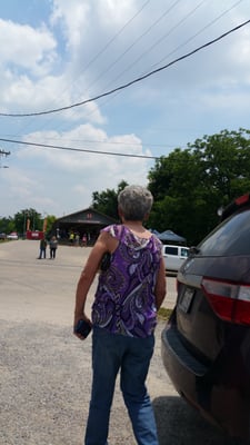 Small town farmers market friendly folks go by for a visit