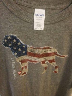 This is a beautiful flag-inspired dog shirt with the TSC logo. My camera stinks. They carry child size XL, for us wee adults. -E